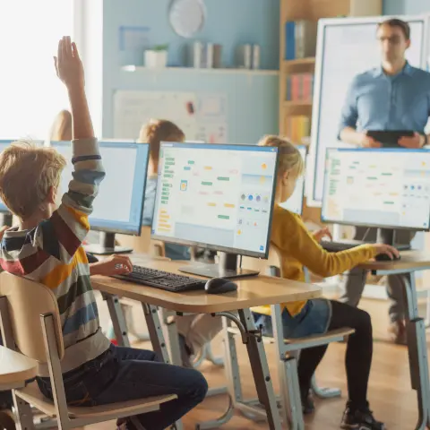 Kid raising hand classroom